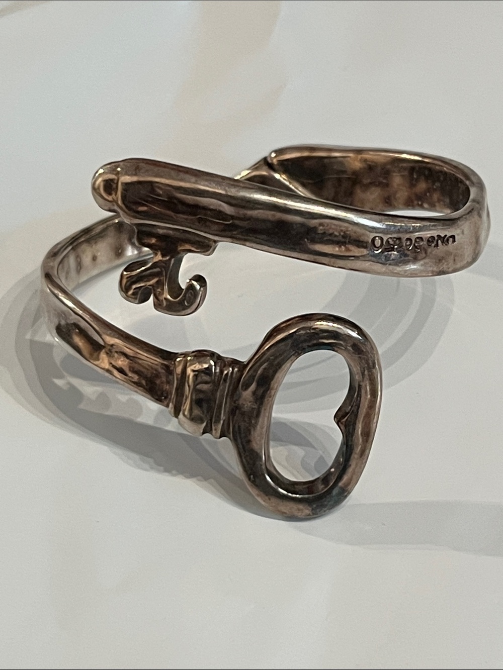 UNO DE 50 Sterling Silver Key Motif Wrap Bracelet